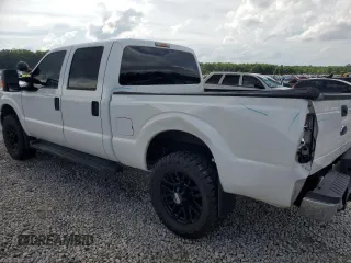 2014 Ford F-250 XL with VIN 1FT7W2B69EEB09366, listed as a Copart auction lot 60901435 with 155,083 mi miles and Salvage title. Bid and sale history available at DreamBid. Image 2.