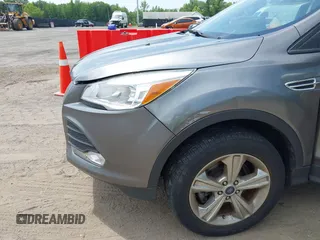2013 Ford Escape SE z VIN 1FMCU0G9XDUB65263, wystawiony jako IAAI lot #42465579 z przebiegiem 196 751 mil mil oraz . Historia ofert i sprzedaży dostępna na DreamBid. Obrazek 6.