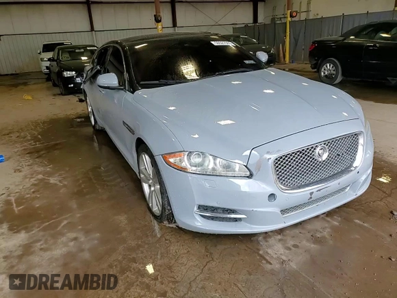 2013 Jaguar XJ with VIN SAJWJ1CD1D8V51462, listed as a Copart auction lot 50527985 with 62,995 mi miles and Salvage title. Bid and sale history available at DreamBid. Image 14.