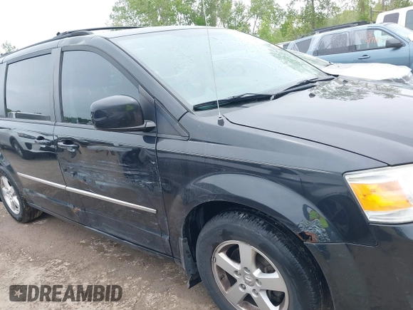 2010 Dodge Grand Caravan SXT z VIN 2D4RN5D12AR444953, wystawiony jako IAAI lot #42247277 z przebiegiem 214 387 mil mil oraz . Historia ofert i sprzedaży dostępna na DreamBid. Obrazek 6.
