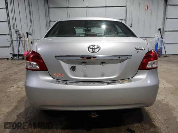 2012 Toyota Yaris with VIN JTDBT4K39C1415296, listed as a Copart auction lot 44793505 with 205,365 mi miles and Salvage Title. Bid and sale history available at DreamBid. Image 6.