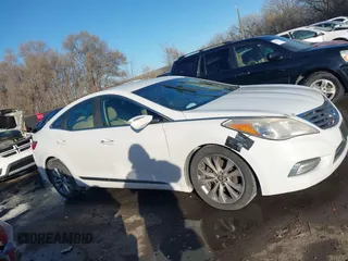 2014 Hyundai Azera with VIN KMHFG4JG6EA354949, listed as a IAAI auction lot 41034372 with 173,338 mi miles and . Bid and sale history available at DreamBid. Image 13.