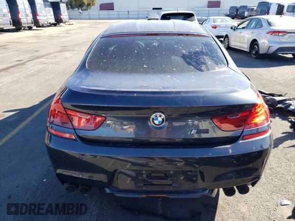 2015 BMW M6 z VIN WBS6C9C5XFD467854, wystawiony jako Copart lot #78871744 z przebiegiem 55 789 mil mil oraz Szkody całkowita. Historia ofert i sprzedaży dostępna na DreamBid. Obrazek 6.