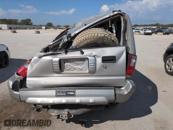 2004 Isuzu Rodeo S with VIN 4S2DM58W144316571, listed as a Copart auction lot 72086554 with Not Provided miles and Salvage Title. Bid and sale history available at DreamBid. Image 6.