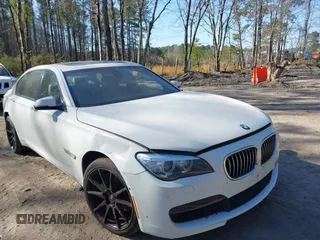 2014 BMW 7 Series 740Li with VIN WBAYE4C59ED138409, listed as a IAAI auction lot 41785423 with 121,687 mi miles. Bid and sale history available at carsss.com. Image 1.
