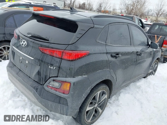 2019 Hyundai Kona Limited with VIN KM8K33A58KU240609, listed as a IAAI auction lot 41272652 with 123,045 mi miles. Bid and sale history available at carsss.com. Image 4.