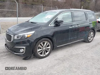 2016 Kia Sedona SX-L with VIN KNDME5C13G6184930, listed as a IAAI auction lot 41385207 with 136,447 mi miles and . Bid and sale history available at carsss.com. Image 2.