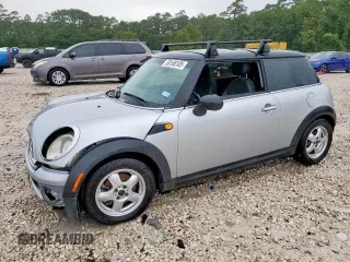 2009 MINI Hardtop z VIN WMWMF33509TU75603, wystawiony jako Copart lot #58168105 z przebiegiem 162 737 mil mil oraz Szkoda całkowita • Salvage title. Historia ofert i sprzedaży dostępna na DreamBid. Obrazek 1.