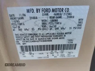 2007 Ford Escape Hybrid with VIN 1FMCU49H27KB80996, listed as a Copart auction lot 50178495 with 161,080 mi miles and Salvage Title. Bid and sale history available at carsss.com. Image 14.
