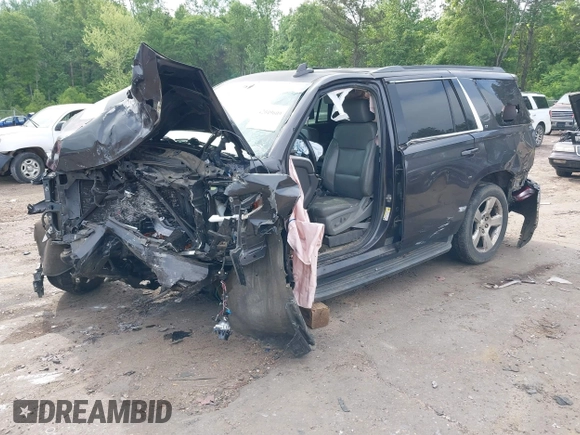 2015 Chevrolet Tahoe LT with VIN 1GNSCBKC1FR743152, listed as a IAAI auction lot 42049609 with Not provided miles and . Bid and sale history available at DreamBid. Image 2.