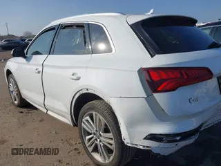 2018 Audi Q5 Premium Plus with VIN WA1BNAFY1J2220714, listed as a IAAI auction lot 41209386 with 70,012 mi miles and . Bid and sale history available at DreamBid. Image 3.