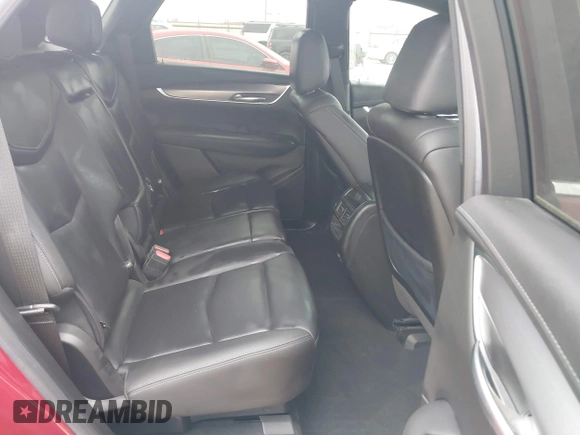 2023 Cadillac XT5 FWD Luxury z VIN 1GYKNAR42PZ147121, wystawiony jako IAAI lot #41315848 z przebiegiem 10 444 mil mil oraz . Historia ofert i sprzedaży dostępna na DreamBid. Obrazek 8.