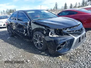 2020 Toyota Camry SE z VIN 4T1G11BK2LU016256, wystawiony jako IAAI lot #41664560 z przebiegiem 58 328 mil mil oraz . Historia ofert i sprzedaży dostępna na DreamBid. Obrazek 1.