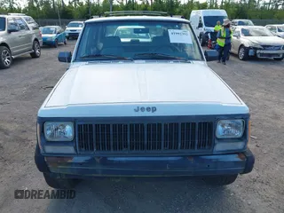 1994 Jeep Cherokee Sport with VIN 1J4FT68S7RL160652, listed as a IAAI auction lot 41992392 with 158,122 mi miles and . Bid and sale history available at DreamBid. Image 6.