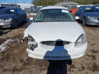 2001 Ford Taurus SES with VIN 1FAFP55231A243171, listed as a IAAI auction lot 41429890 with 131,537 mi miles. Bid and sale history available at carsss.com. Image 12.