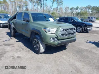 2016 Toyota Tacoma SR with VIN 3TMCZ5ANXGM038420, listed as a IAAI auction lot 41635372 with 113,723 mi miles. Bid and sale history available at carsss.com. Image 1.