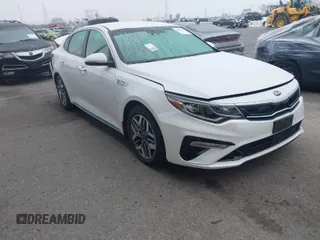 2020 Kia Optima Hybrid EX with VIN KNAGU4LE3L5037307, listed as a IAAI auction lot 41483227 with 84,834 mi miles. Bid and sale history available at carsss.com. Image 1.