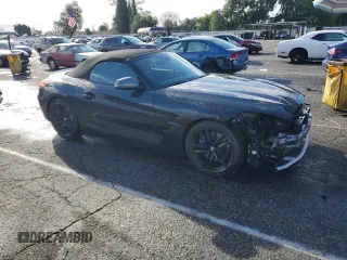2020 BMW Z4 sDriveM40i with VIN WBAHF9C02LWW55809, listed as a Copart auction lot 48812855 with 39,680 mi miles and Salvage Title. Bid and sale history available at carsss.com. Image 4.