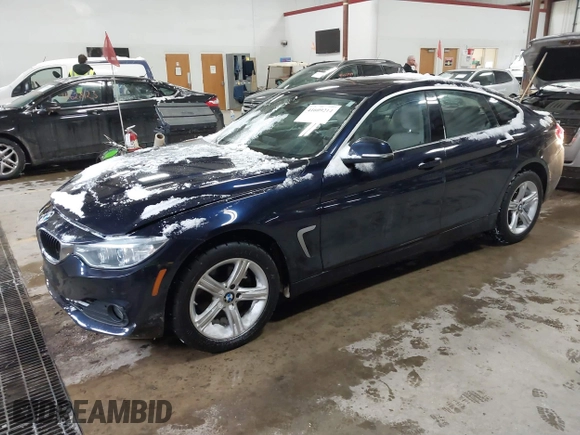 2015 BMW 4 Series 428i xDrive with VIN WBA4A7C57FD414955, listed as a IAAI auction lot 41609214 with 69,125 mi miles and . Bid and sale history available at DreamBid. Image 17.