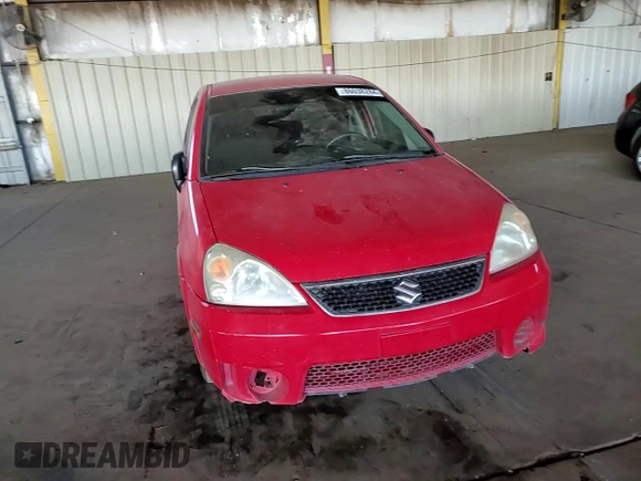 2005 Suzuki Aerio S z VIN JS2RA62S555256527, wystawiony jako Copart lot #86038284 z przebiegiem 135 296 mil mil oraz Szkoda całkowita • Salvage title. Historia ofert i sprzedaży dostępna na DreamBid. Obrazek 11.