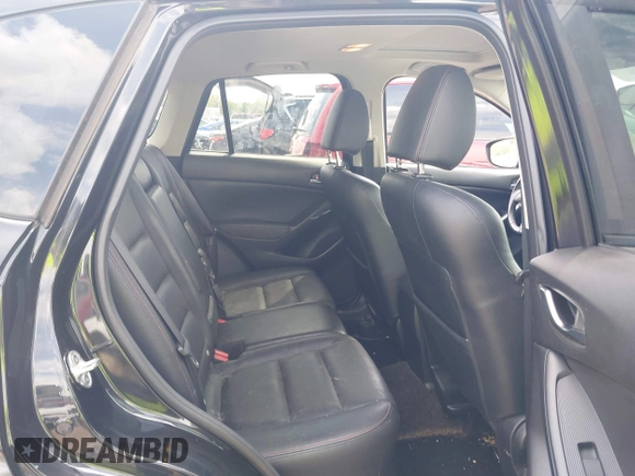 2013 Mazda CX-5 Grand Touring with VIN JM3KE4DE6D0148030, listed as a IAAI auction lot 42082947 with 119,432 mi miles and . Bid and sale history available at DreamBid. Image 8.