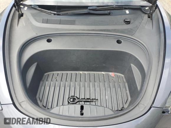 2022 Tesla Model 3 z VIN 5YJ3E1EA6NF185895, wystawiony jako Copart lot #60165405 z przebiegiem 190 572 mil mil oraz Czysty tytuł • Clean title. Historia ofert i sprzedaży dostępna na DreamBid. Obrazek 11.