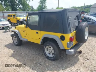 2002 Jeep Wrangler X with VIN 1J4FA39S02P727172, listed as a IAAI auction lot 42612634 with 108,788 mi miles and . Bid and sale history available at DreamBid. Image 3.