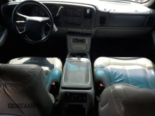 2002 Chevrolet Suburban LS with VIN 3GNEC16Z62G333723, listed as a Copart auction lot 59949255 with 151,548 mi miles and Salvage title. Bid and sale history available at DreamBid. Image 8.