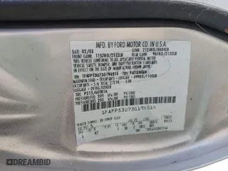 2003 Ford Taurus SE Standard with VIN 1FAFP53U73G194514, listed as a IAAI auction lot 42086767 with 81,917 mi miles. Bid and sale history available at carsss.com. Image 9.