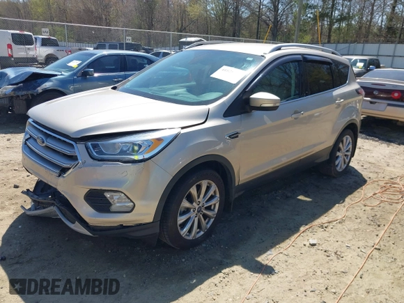 2017 Ford Escape Titanium with VIN 1FMCU9JD3HUC90273, listed as a IAAI auction lot 41828236 with 71,351 mi miles. Bid and sale history available at carsss.com. Image 16.