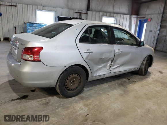 2010 Toyota Yaris with VIN JTDBT4K3XA1382385, listed as a Copart auction lot 48544795 with 169,664 mi miles and Salvage Title. Bid and sale history available at DreamBid. Image 3.