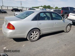 2000 Toyota Avalon XL with VIN 4T1BF28B7YU112576, listed as a Copart auction lot 59726505 with 242,412 mi miles and Salvage title. Bid and sale history available at DreamBid. Image 3.