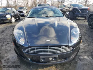 2009 Aston Martin DB9 with VIN SCFAD02E79GB10991, listed as a Copart auction lot 85487894 with 0 mi miles and Salvage Title. Bid and sale history available at carsss.com. Image 5.