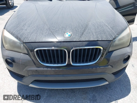 2014 BMW X1 sDrive28i z VIN WBAVM1C50EVW54351, wystawiony jako IAAI lot #42117685 z przebiegiem 131 631 mil mil oraz . Historia ofert i sprzedaży dostępna na DreamBid. Obrazek 6.