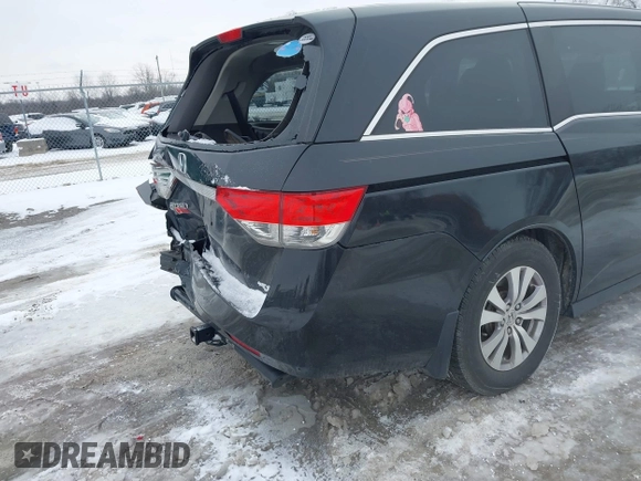2015 Honda Odyssey EX-L with VIN 5FNRL5H60FB018030, listed as a IAAI auction lot 41608357 with 166,214 mi miles and . Bid and sale history available at carsss.com. Image 17.