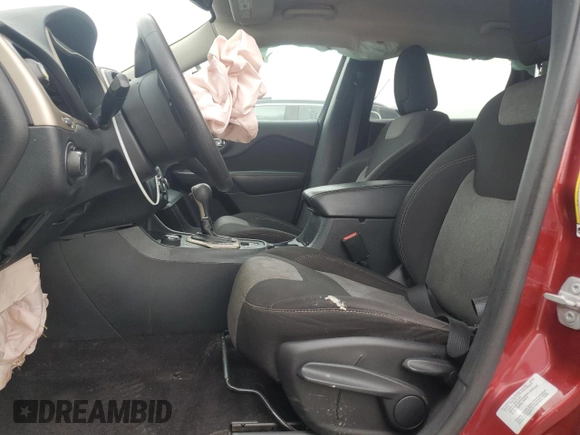 2016 Jeep Cherokee Altitude with VIN 1C4PJMAS8GW219251, listed as a Copart auction lot 58808205 with 133,074 mi miles and Salvage title. Bid and sale history available at DreamBid. Image 7.