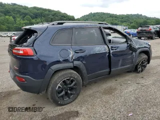 2015 Jeep Cherokee Trailhawk with VIN 1C4PJMBB8FW740452, listed as a Copart auction lot 63023715 with 96,236 mi miles and Salvage title. Bid and sale history available at DreamBid. Image 3.