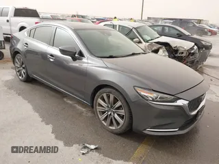 2020 Mazda 6 Signature with VIN JM1GL1XY6L1522900, listed as a IAAI auction lot 41724818 with 62,846 mi miles and . Bid and sale history available at DreamBid. Image 1.