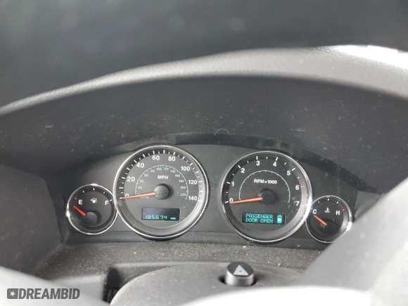 2007 Jeep Commander Sport with VIN 1J8HG48PX7C672897, listed as a Copart auction lot 43740985 with 185,674 mi miles and Salvage Title. Bid and sale history available at carsss.com. Image 9.