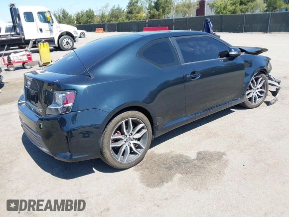 2015 Scion tC with VIN JTKJF5C77F3094936, listed as a IAAI auction lot 41830668 with 89,727 mi miles. Bid and sale history available at carsss.com. Image 4.
