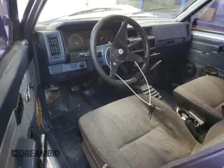 1986 Nissan Hardbody E z VIN JN6ND11S8GW026883, wystawiony jako Copart lot #84040874 z przebiegiem 193 104 mil mil oraz Szkody całkowita. Historia ofert i sprzedaży dostępna na DreamBid. Obrazek 8.