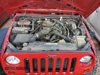 2009 Jeep Wrangler X with VIN 1J4FA24169L727333, listed as a Copart auction lot 47861445 with 70,343 mi miles and Salvage Title. Bid and sale history available at DreamBid. Image 12.