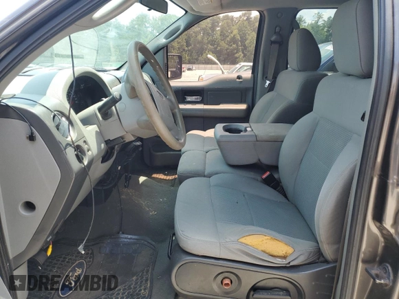 2007 Ford F-150 XLT with VIN 1FTRW12W67KA45553, listed as a Copart auction lot 63635795 with 271,062 mi miles and Salvage title. Bid and sale history available at DreamBid. Image 7.