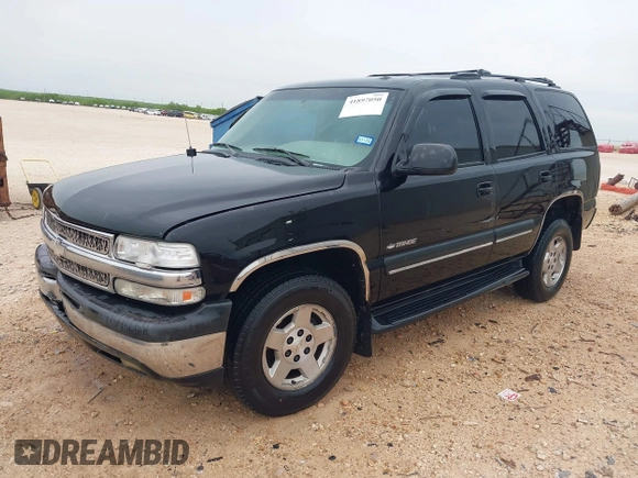 2002 Chevrolet Tahoe LT with VIN 1GNEC13Z72R176028, listed as a IAAI auction lot 41897050 with 216,553 mi miles. Bid and sale history available at carsss.com. Image 2.