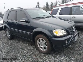 2002 Mercedes-Benz M-Class with VIN 4JGAB54E72A296354, listed as a IAAI auction lot 41277897 with 101,842 mi miles. Bid and sale history available at carsss.com. Image 1.