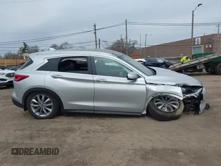 2019 Infiniti QX50 Essential with VIN 3PCAJ5M37KF143597, listed as a IAAI auction lot 41827890 with 39,975 mi miles and . Bid and sale history available at DreamBid. Image 13.