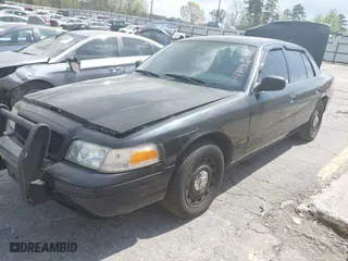 2004 Ford Police Interceptor Base w/3.27 Axle with VIN 2FAFP71W34X136279, listed as a IAAI auction lot 41945086 with 151,350 mi miles. Bid and sale history available at carsss.com. Image 2.