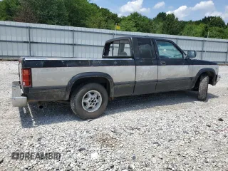 1995 Dodge Dakota z VIN 1B7GL23Y9SS385794, wystawiony jako Copart lot #63360094 z przebiegiem 394 435 mil mil oraz Szkoda całkowita • Salvage title. Historia ofert i sprzedaży dostępna na DreamBid. Obrazek 3.