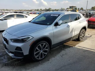 2021 BMW X2 xDrive28i with VIN WBXYJ1C07M5S52616, listed as a Copart auction lot 70234144 with 96,459 mi miles and Salvage Title. Bid and sale history available at carsss.com. Image 1.