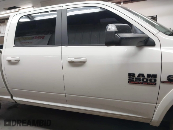 2017 Ram 2500 Laramie with VIN 3C6UR5FL1HG726325, listed as a IAAI auction lot 42315570 with 104,038 mi miles and . Bid and sale history available at DreamBid. Image 13.